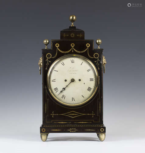 A Regency brass inlaid ebonized case bracket clock with eight day twin fusee movement striking on