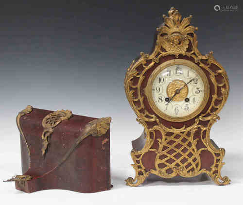 A late 19th century French gilt metal mounted mahogany balloon cased bracket clock with eight day