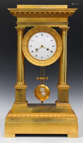 An impressive mid-19th century French ormolu portico clock, the drum-cased eight day movement