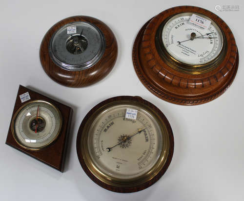 A late Victorian Negretti & Zambra circular wall barometer, the signed circular dial numbered '