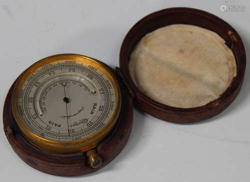 A late 19th/early 20th century gilt brass cased pocket barometer, the silvered dial with mercury