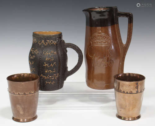 A pair of Doulton Lambeth Silicon stoneware beakers, late 19th/early 20th century, modelled as