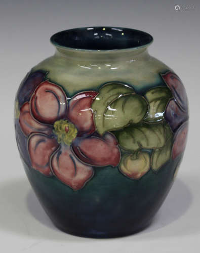 A Moorcroft pottery Clematis pattern vase, circa 1946-75, painted initials and impressed marks to
