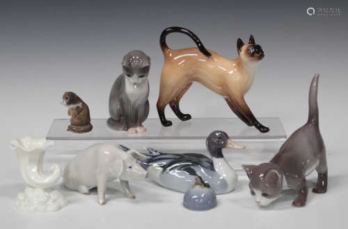 Six Royal Copenhagen porcelain animals, including drake, No. 119, pig, No. 1400, cat with tail up,