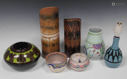 A small group of mostly Poole pottery, 20th century, including two Sienna range cylindrical vases,