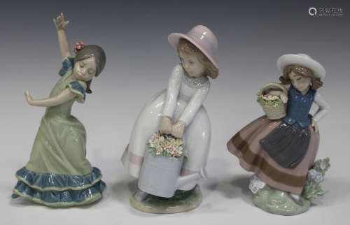 Three Lladro porcelain figures, comprising Lolita, No. 5192, Sweet Scent, No. 5221, and Springtime