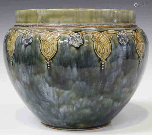 A Royal Doulton stoneware jardinière of bulbous shape, covered in a streaked green glaze, a