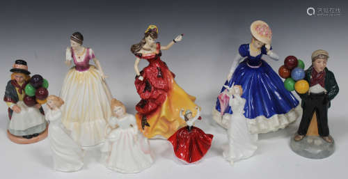 Nine Royal Doulton figures, comprising 'Balloon Girl', HN2818, 'Balloon Boy', HN2934, 'Mary',