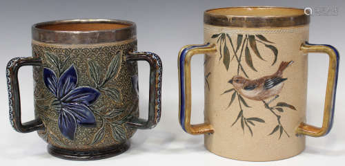 A Doulton Lambeth stoneware tyg, late 19th century, by Louisa Davis, decorated with stylized blue