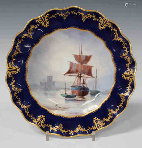 A Royal Crown Derby bone china plate, circa 1904, painted by W.E.J. Dean, signed, with sailing boats