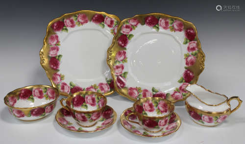 A Royal Albert Old English Rose pattern part tea service, comprising two cake plates, sugar bowl,