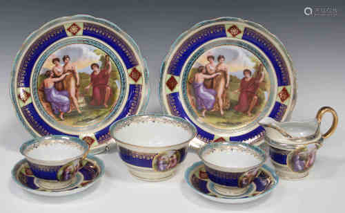 A Continental Vienna style porcelain part tea service, early 20th century, decorated with
