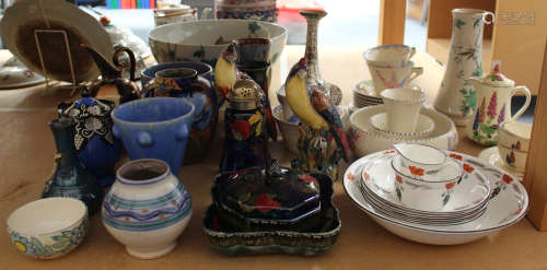 A collection of Art Deco and later decorative ceramics, including a Poole pottery vase, decorated