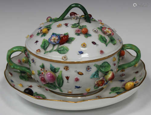 A Meissen porcelain fruit and flower encrusted écuelle, cover and stand, 19th century, applied in