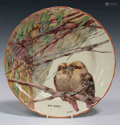 An A.J. Wilkinson Ltd Honeyglaze Kookaburra pattern pottery plate, circa 1925, titled 'Two's