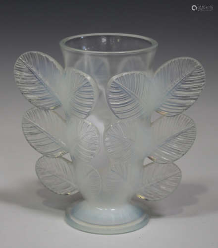 A Pierre D'Avesn Art Deco opalescent glass vase, relief moulded with leaves to the tapered
