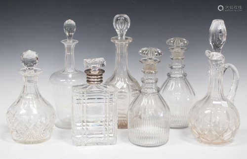 A group of glass decanters and stoppers, 19th century and later, including a pair of triple ring