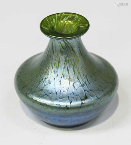 An Art Nouveau Loetz iridescent green glass Papillon pattern vase, circa 1900, of wasted squat form,