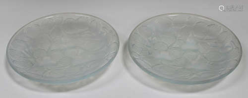 A pair of Art Deco Arrers French opalescent glass dishes, relief moulded to the underside with