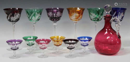 A set of six flashed and cut hock glasses, each raised on an hexagonal stem and star cut foot,