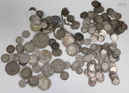 A group of British and world silver, silver nickel and other coins.Buyer’s Premium 29.4% (