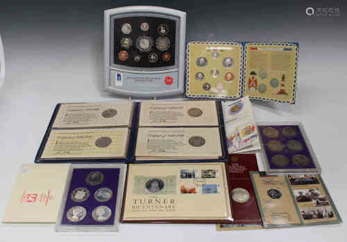 A group of commemorative coins and first day coin covers, including 'The Turner Bicentenary Medallic