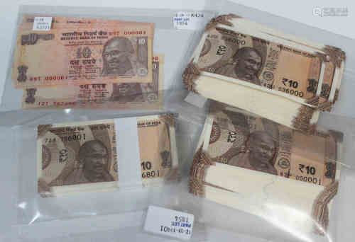 A large collection of India ten rupee banknotes, mostly uncirculated.Buyer’s Premium 29.4% (