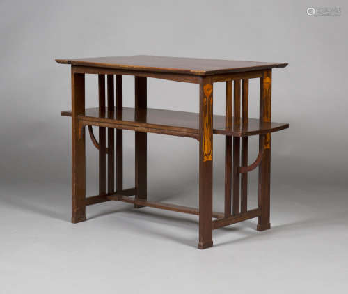 An Edwardian Arts and Crafts mahogany tea table, designed by Leonard Francis Wyburd for Liberty &