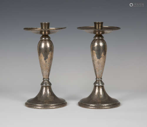 A pair of Liberty & Co 'Tudric' plated pewter candlesticks, model number '01223', the overall