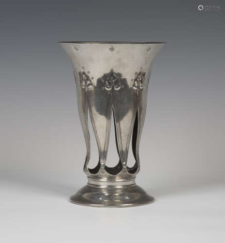 A Liberty & Co 'Tudric' pewter vase of flared trumpet form, model number '01040', the pierced body