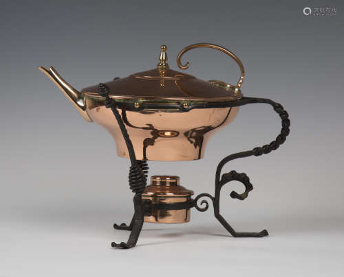 A late Victorian copper kettle on a wrought iron heater stand, in the manner of W.A.S. Benson, the