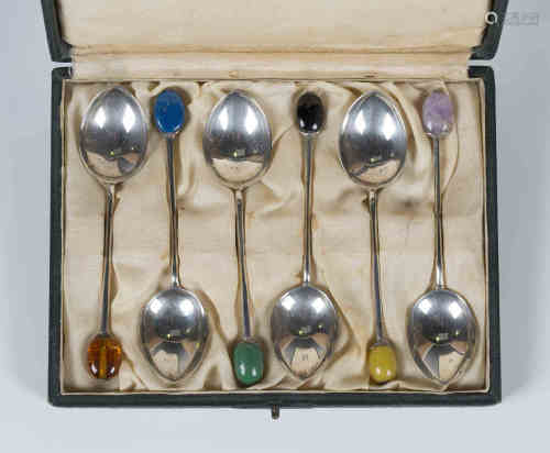 A set of six Liberty & Co silver coffee spoons, each handle with a hardstone terminal, Birmingham