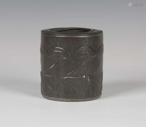 A Liberty & Co 'Tudric' pewter cylindrical tobacco box and cover, designed by Archibald Knox,