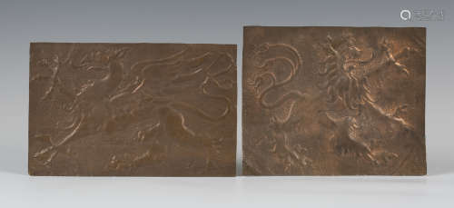 Two early 20th century Arts and Crafts hammered copper rectangular panels, each finely worked with a