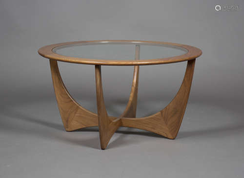 A mid-20th century G Plan teak circular coffee table, designed by Victor Wilkins, the circular top