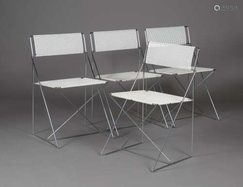 A set of four 1970s chromium plated and perforated steel 'X-Line' stacking chairs, designed by Niels