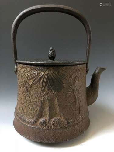 A JAPANESE OLD IRON TEA POT. MARKED.