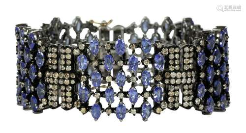 Tanzanite, diamond, blackened silver and 14k yellow