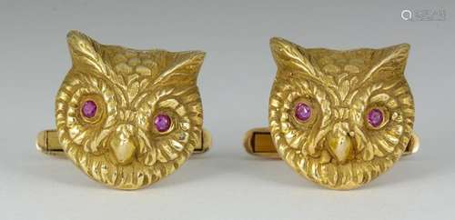 Pair of ruby, 14k yellow gold owl cufflinks