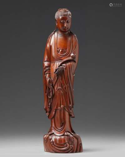 A Chinese boxwood carving of Guanyin