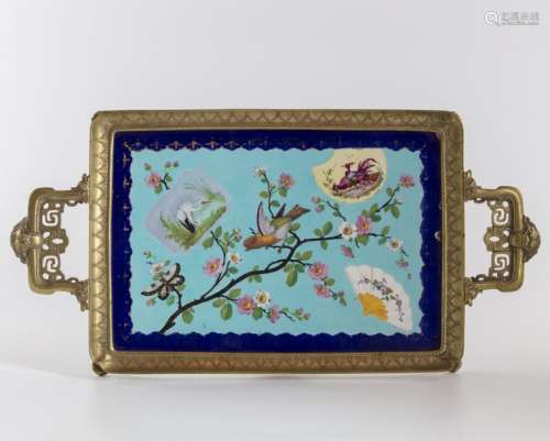 A Chinese porcelain plaque mounted in a bronze mon…