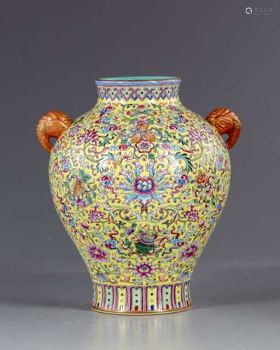 A Chinese famille rose yellow ground vase