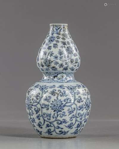 A Chinese blue and white double gourd vase