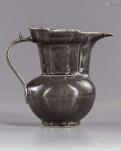 A Chinese black glazed jug