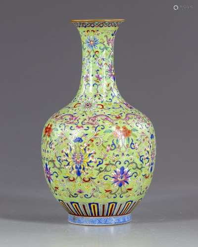 A Chinese famille rose lime green vase