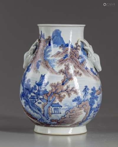 A Chinese brown and blue hu vase
