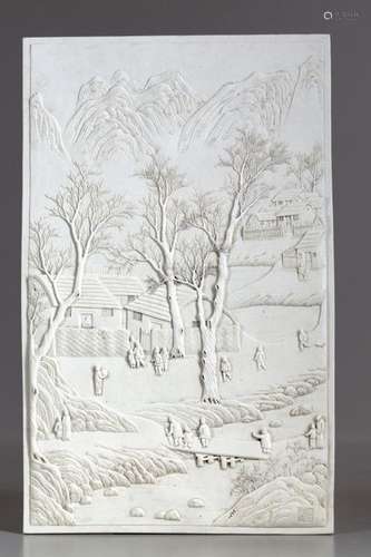 A Chinese winter landscape porcelain plaque