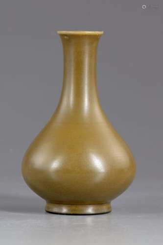 A Chines olive green glazed vase