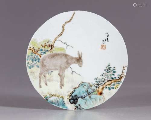 A circular Chinese porcelain plaque