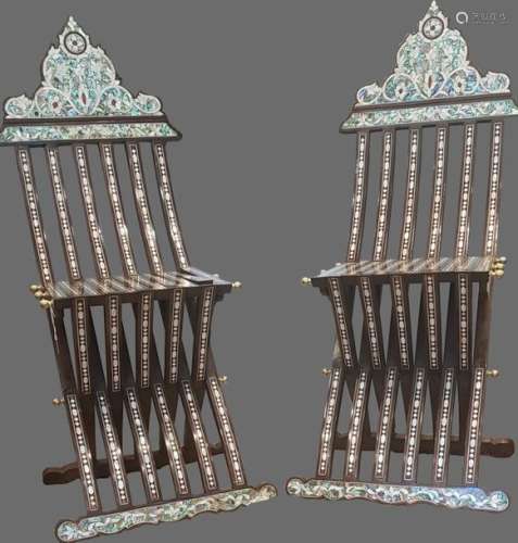 Two wooden mother of pearl inlaid chairs
